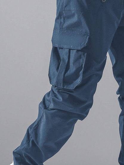 Manfinity Hypemode Loose Fit Men'S Cargo Pants with Flap Pockets, Side Drawstring and Elastic Waist, for Fall